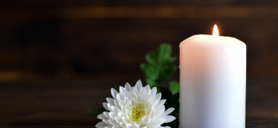 Candle and white Chrysanthemum flower